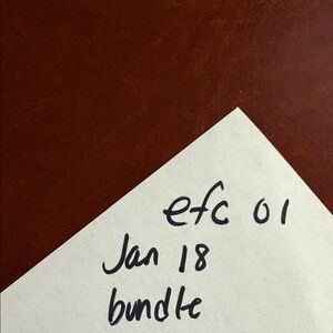 Handwritten Note on White Paper